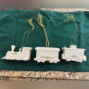 Lenox - Set of three train Christmas ornaments: engine, passenger car & caboose.